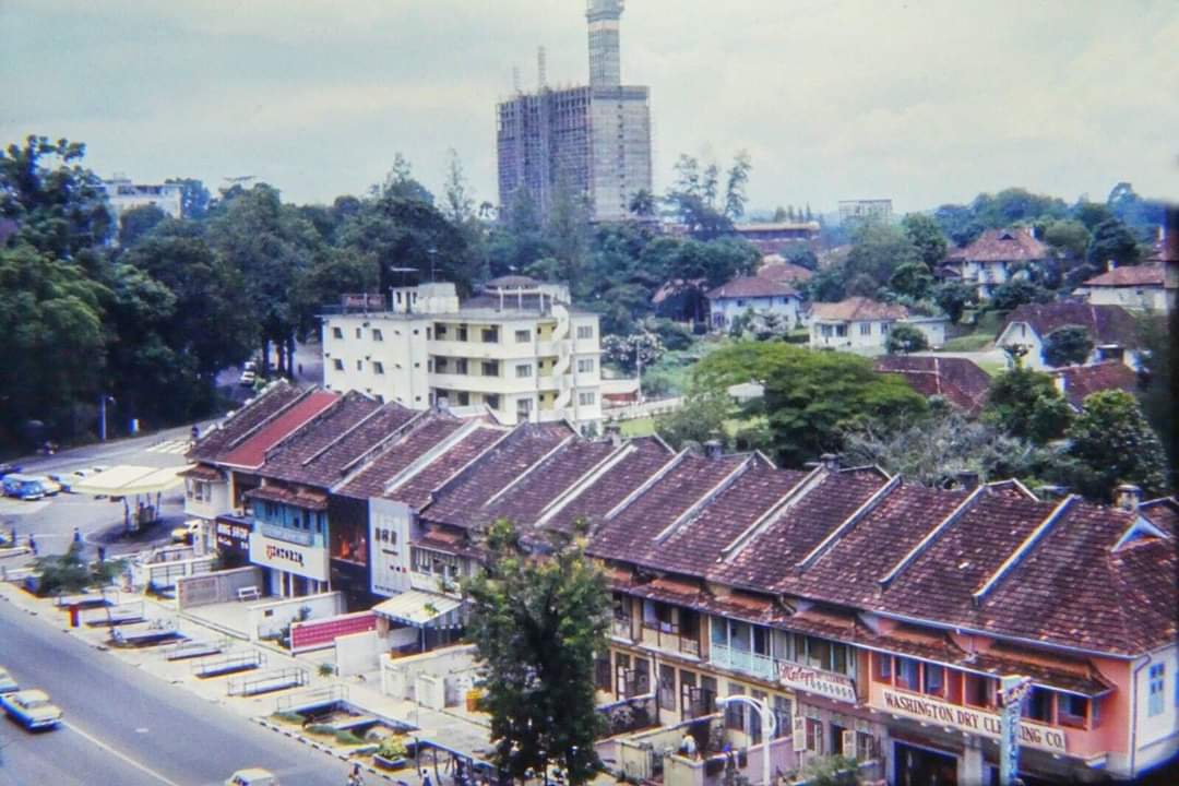 Heritage photo of a row of Singapore shophouses, where the Astoria family laundry story began